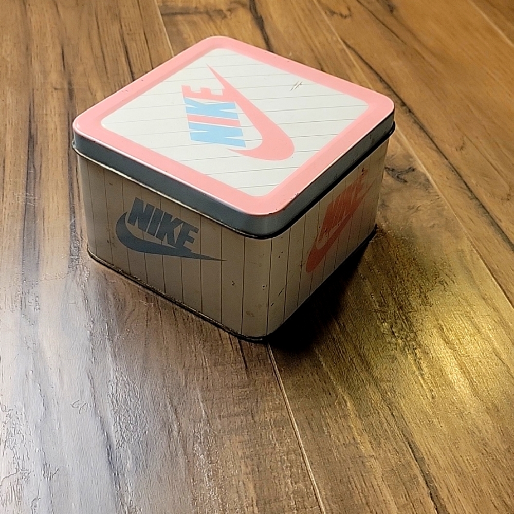 Vintage 1986 Nike swoosh pink and blue metal baby shoe tin